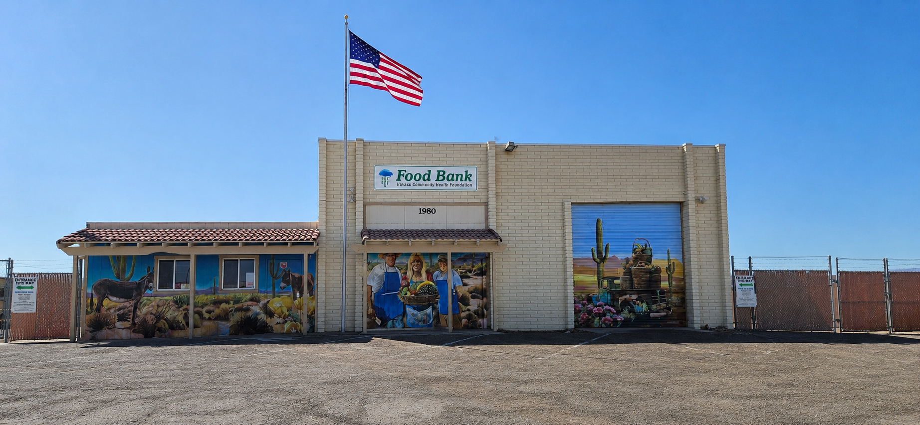 HCHF Food Bank building with community murals and entrance